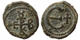 Maurice Tiberius, 582-602. Pentanummium (bronze, 1.27 g, 14 mm), Theoupolis (Antioch). Monogram 17. Rev. Large Є; cross to right. SB 542. Very fine. V...