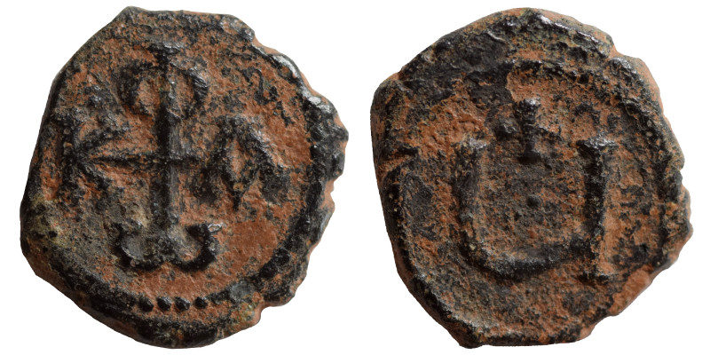 Phocas, 602-610. Pentanummium (bronze, 1.39 gr, 13 mm), Antioch. Monogram of Pho...