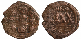 Heraclius, with Martina and Heraclius Constantine, 610-641. Follis (bronze, 5.75 g, 24 mm), Thessalonica. Heraclius, in center, flanked by Martina, on...