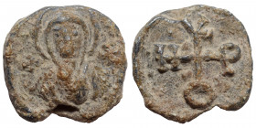 Lead seal (5.67 g, 19 mm). Nimbate facing bust of the Mother of God holding Christ. Rev. Cruciform monogram. Very fine.