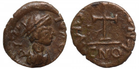 Barbarian imitation, circa 5th-6th century. Nummus (bronze, 0.52 g, 10 mm). Pearl-diademed, draped, and cuirassed bust right, blundered legend around....