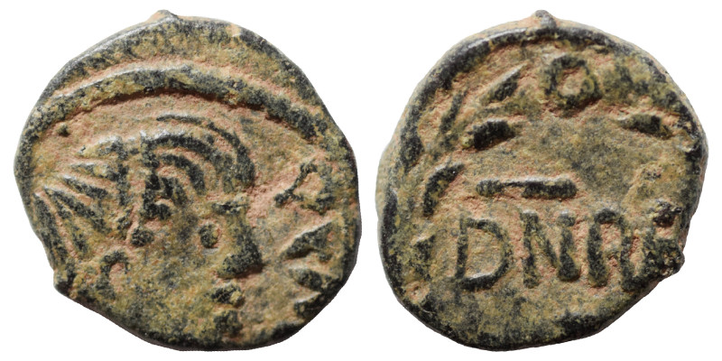 THE OSTROGOTHS. Baduila, 541-552. Nummus (bronze, 0.49 g, 9 mm), Ticinum. Pearl-...