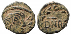 THE OSTROGOTHS. Baduila, 541-552. Nummus (bronze, 0.49 g, 9 mm), Ticinum. Pearl-diademed, draped and cuirassed bust right. Rev. DN REX in field below,...