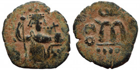 ISLAMIC. Arab-Byzantine, Umayyad Caliphate, circa AD 658-664. Fals (bronze, 3.98 g, 25 mm), Damascus. Imitative of Constans II, standing imperial figu...