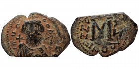 ISLAMIC. Time of the Rashidun. Pseudo-Byzantine types. Fals (bronze, 4.02 g, 27x12 mm), imitating a follis of Constans II, uncertain mint, circa 24/5-...