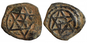 ISLAMIC. Anonymous. Ae manghir (?) (bronze, 1.23 g, 18 mm). Hexagram with six pointed star in center. Rev. Same as obv. Very fine.