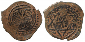 ISLAMIC. Qrim, anonymous anepigraphic type. Ae manghir (bronze, 0.83 g, 19 mm). Hexagram with star in center. Rev. Floral pattern. Zeno 257327. Very f...