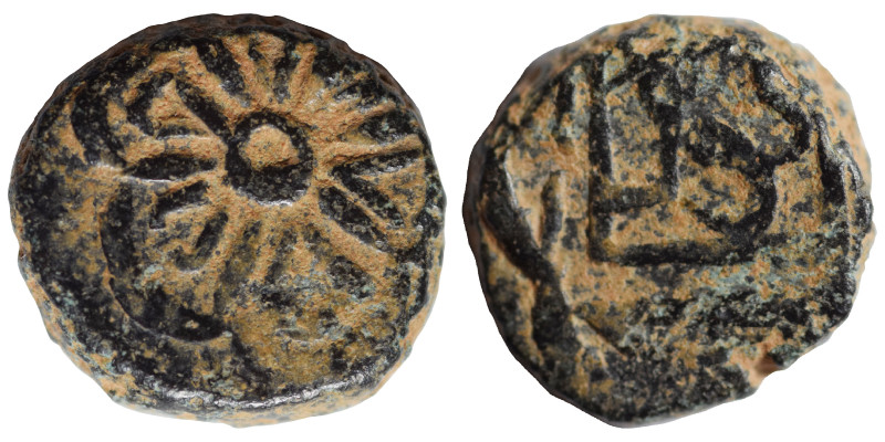 ISLAMIC. Uncertain. Ae (bronze, 3.19 g, 13 vmm). Floral patter. Rev Arabic legen...