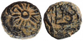 ISLAMIC. Uncertain. Ae (bronze, 3.19 g, 13 vmm). Floral patter. Rev Arabic legend or/with Tamgha. Nearly very fine.