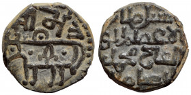 KHWAREZMSHAHS. Ala ud-Din Muhammad II (1200-1220), Ae jital (bronze, 2.50 g, 15 mm). Bull to left; legend above. Rev. Islamic legend. Tye 291-297 (?)....