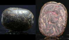 Egypte - Basse époque - Scarabée en pierre - 664 / 332 av. J.-C. (26ème-30ème dynastie)
Scarabée en granite noir dont l'empreinte représente un perso...