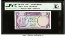 Qatar & Dubai Currency Board 5 Riyals ND (ca. 1960) Pick 2a PMG Gem Uncirculated 65 EPQ. A high grade 5 Riyals from the Currency Board of Qatar and Du...