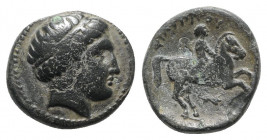 Kings of Macedon, Philip II (359-336). Æ (19mm, 5.35g, 9h). Uncertain mint. Head of Apollo r., wearing tainia. R/ Youth on horseback r.; monogram belo...