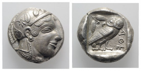 Attica, Athens, c. 475-465 BC. AR Tetradrachm (24mm, 17.21g, 3h). Head of Athena r., wearing crested Attic helmet decorated with three olive leaves an...