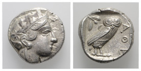 Attica, Athens, c. 454-404 BC. AR Tetradrachm (25mm, 17.17g, 8h). Head of Athena r., wearing crested Attic helmet decorated with three olive leaves an...