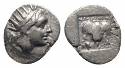 Island of Caria, Rhodes, c. 88-84 BC. AR Drachm (16mm, 1.90g, 12h). Nikephoros, magistrate. Radiate head of Helios r. R/ Rose with bud to r.; hand hol...