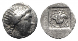 Islands of Caria, Rhodes, c. 88-84 BC. AR Drachm (14mm, 1.71g, 11h). Radiate head of Helios r. R/ Rose with bud to r.; hand holding grain ear to lower...