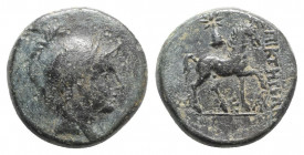 Phrygia, Epikteteis, 2nd-1st century BC. Æ (18mm, 7.21g, 12h). Helmeted and draped bust of Athena(?) r. R/ Horse prancing r.; pileos surmounted by sta...