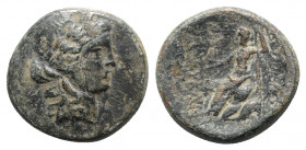 Phrygia, Hierapolis. Pseudo-autonomous, c. 12 BC -14 AD. Æ (21mm, 6.69g, 1h). Laureate head of Apollo r. R/ Zeus seated l. on rocks, holding nike and ...
