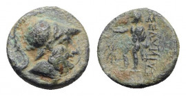 Pamphylia, Sillyon, late 4th-early 3rd century BC. Æ (12mm, 2.41g, 12h). Bearded head of Ares r., wearing crested Corinthian helmet. R/ Male figure st...