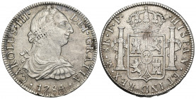 CARLOS III. 8 reales. 1784. México. FF. AR 26,8 g. 39,5 mm.VI-948. Golpecitos y rayitas en anv. y rev. MBC. Escasa.