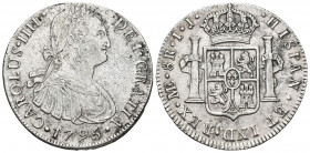 CARLOS IV. 8 reales. 1795. Lima. IJ. AR 26,93 g. 40,05 mm. VI-757. Oxidaciones limpiadas. MBC/MBC+.