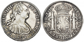 CARLOS IV. 8 reales. 1804. México. TH. AR 26,94 g. 39,9 mm. VI-802. Resto de soldadura en el canto. MBC+.