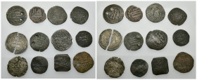 ACUÑACIONES HISPANO-ÁRABES. Lote de 12 monedas: 3 feluses emirales, 7 dírhams taifas, 1 felús nazarí y 1 dírham omeya de Damasco partido. Calidad medi...