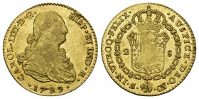CARLOS IV. 2 escudos. 1799. Sevilla. CN. AU 6,75 g. 22,5 mm. VI-1160. Rayas de ajuste en anv. y acuñación floja en rev. R.B.O. MBC+/EBC-.