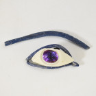ANTIGUO EGIPTO. Contorno de ojo en vidrio azul, con pupila. Dinastía XVIII (c. 1550-1292 a. C). Vidrio. Longitud 9,5 cm.