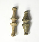 ROMA. Imperio Romano. Lote de 2 pasadores de bocado de caballo (ss. I-II d.C.). Bronce. Altura 4,5 y 5,2 cm.
