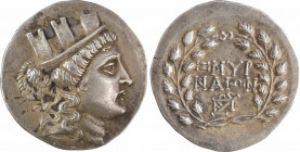Ionie, Smyrne, tétradrachme, c.155-145 av. J.-C
A/Anépigraphe
Tête tourelée de Smyrne à droite, les cheveux tombant sur la nuque
Légende en deux li...