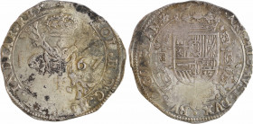 Flandre (comté de), Charles II, patagon, 1667 Bruges
A/(atelier). CAROL. II. D. G. HISP. ET INDIAR. REX
Briquet couronné posé sur deux bâtons noueux...