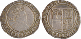 Angleterre, Jacques I, XII pence ou shilling, s.d. (16005-1606) Londres (Tower)
A/(rose). IACOBVS. D'. G'. MAG'. BRIT'. FRAN'. ET. HIB'. REX
Buste d...