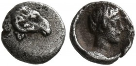 CARIA. Halikarnassos. 5th century BC. Hemitetartemorion (Silver, 5 mm, 0.10 g, 9 h). Head of a ram to right. Rev. Youthful male head to right. SNG Kec...