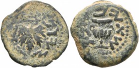 JUDAEA, First Jewish War. 66-70 AD. Prutah (Bronze, 18 mm, 3.74 g, 5 h), Year 2 = 67/8. Vine leaf on branch with tendril. Rev. Amphora. Hendin 1360. M...