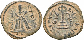 ISLAMIC, Umayyad Caliphate. temp. 'Abd al-Malik ibn Marwan , AH 65-86 / AD 685-705. Fals (Copper, 23 mm, 2.59 g, 1 h), Standing Caliph, Manbij (Hierap...