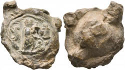 SEALS, Roman. Seal (Lead, 24 mm, 9.19 g), circa 3rd century AD. Male figure advancing right, holding an uncertain object with both hands and looking b...