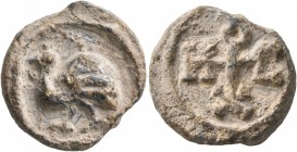 SEALS, Byzantine. Seal (Lead, 19 mm, 6.87 g, 7 h), circa 6th-7th century. Peacock walking to left. Rev. Cruciform monogram . Very fine.