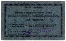 DEUTSCHE KOLONIEN, Deutsch-Ost-Afrika, 1905-1917, 5 Rupien 01.11.1915, Interims-Banknote. Serie F, Karton blaugrau, grobe Jutepressung, Zwei linke Fak...