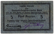 DEUTSCHE KOLONIEN, Deutsch-Ost-Afrika, 1905-1917, 5 Rupien 01.11.1915, Interims-Banknote. Serie F, Karton blaugrau, grobe Jutepressung, Zwei linke Fak...