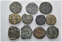 11 Ancient Bronze Pieces 
(70,57gr)