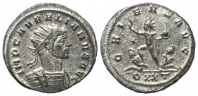 Aurelianus (270 - 275 n. Chr.).

 Antoninian. 274 n. Chr. Ticinum.
Vs: IMP AVRELIANVS AVG. Büste mit Strahlenkrone und Panzer rechts.
Rs: ORIENS A...