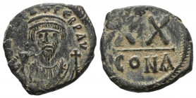 Phocas (602 - 610 n. Chr.).

 1/2 Follis (20 Nummi). Constantinopolis.
Vs: Gekrönte Büste in Konsulargewand mit Mappa und Kreuzszepter en face.
Rs...