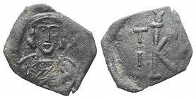 Tiberius III. Apsimarus (698 - 705 n. Chr.).

Halbfollis. Syrakus.
Überprägung auf älterer byzantinischer Bronzemünze.
Vs: Gepanzerte Büste des Ka...