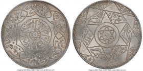 'Abd al-Aziz 2-1/2 Dirhams AH 1314 (1897)-(pa) MS65 NGC, Paris mint, KM-Y11.2. Arrowheads point inward. 

HID09801242017

© 2022 Heritage Auctions...