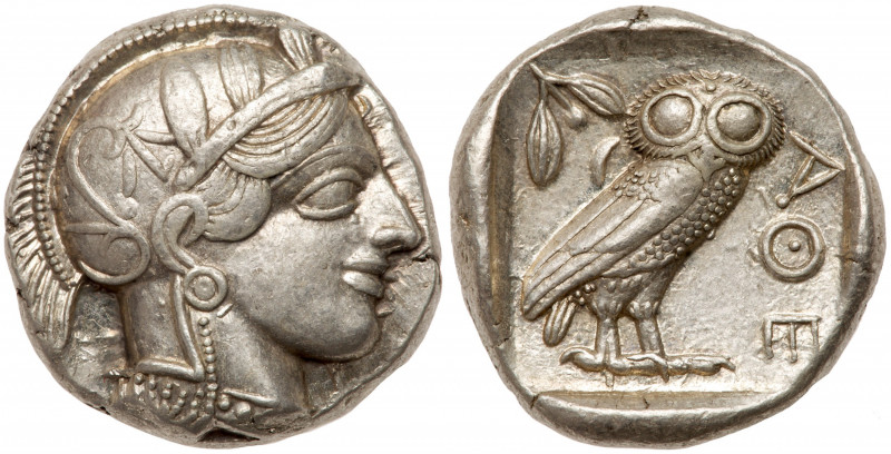 338685. Head of Athena to right; Rev.: Standing owl to right with head facing, o...