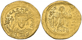 Phocas (602-610), solidus, Constantinople, 603, facing bust wearing pendilia, holding globus cruciger, rev., angel standing facing holding Christogram...