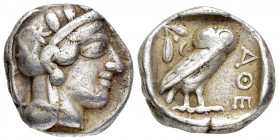 ATTICA.Athens.(Circa 454-404 BC).Tetradrachm.

Obv : Helmeted head of Athena to right.

Rev : AΘE.
Owl standing right, head facing; olive sprig and cr...