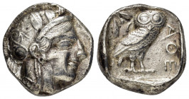 ATTICA.Athens.(Circa 454-404 BC).Tetradrachm.

Obv : Helmeted head of Athena right.

Rev : AΘE.
Owl standing right, head facing; olive sprig and cresc...